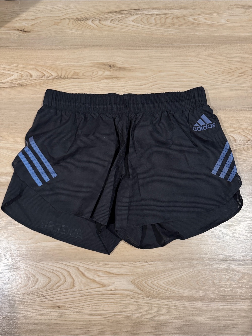 adidas Black Women's Athletic Shorts with Blue Three-Stripes